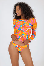 Load image into Gallery viewer, Model Front: Rio De Sol Haut Top Orange-Bloom Rash-Guard