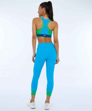 Load image into Gallery viewer, Image 04: Alto Giro Fitness Haut Top Blackout Decote Alto Recortes Azul Vivid