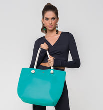 Load image into Gallery viewer, Model Front: Uv Line Sac De Plage Silicone Bag Turquesa
